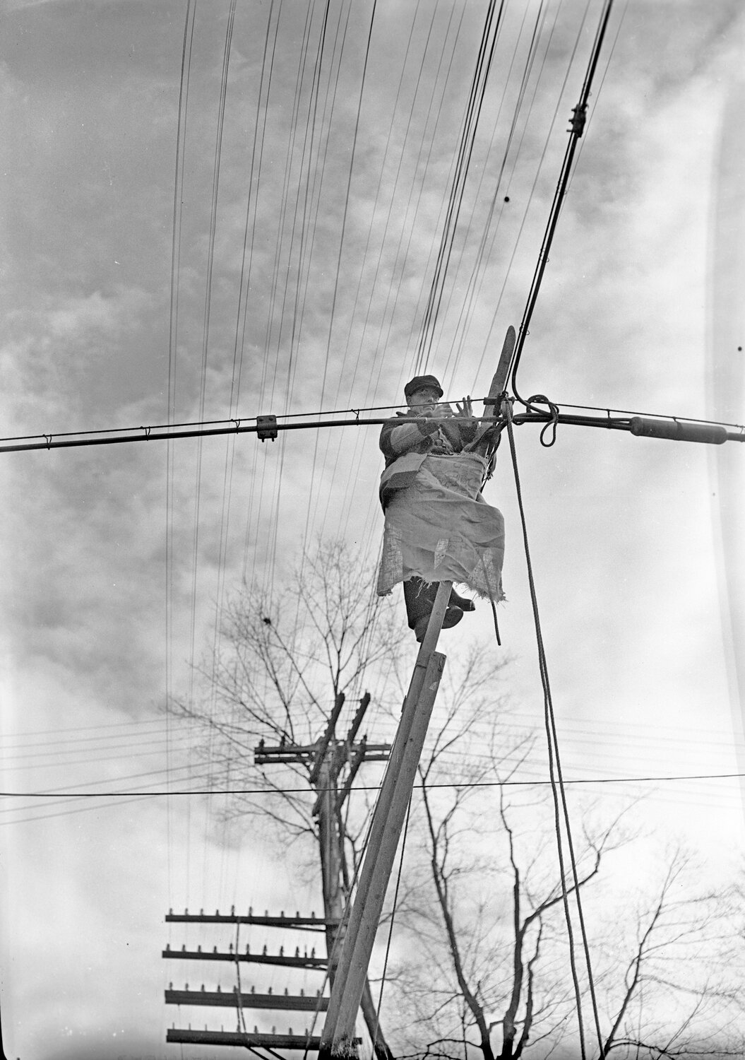 Electric line worker, circa 1939.